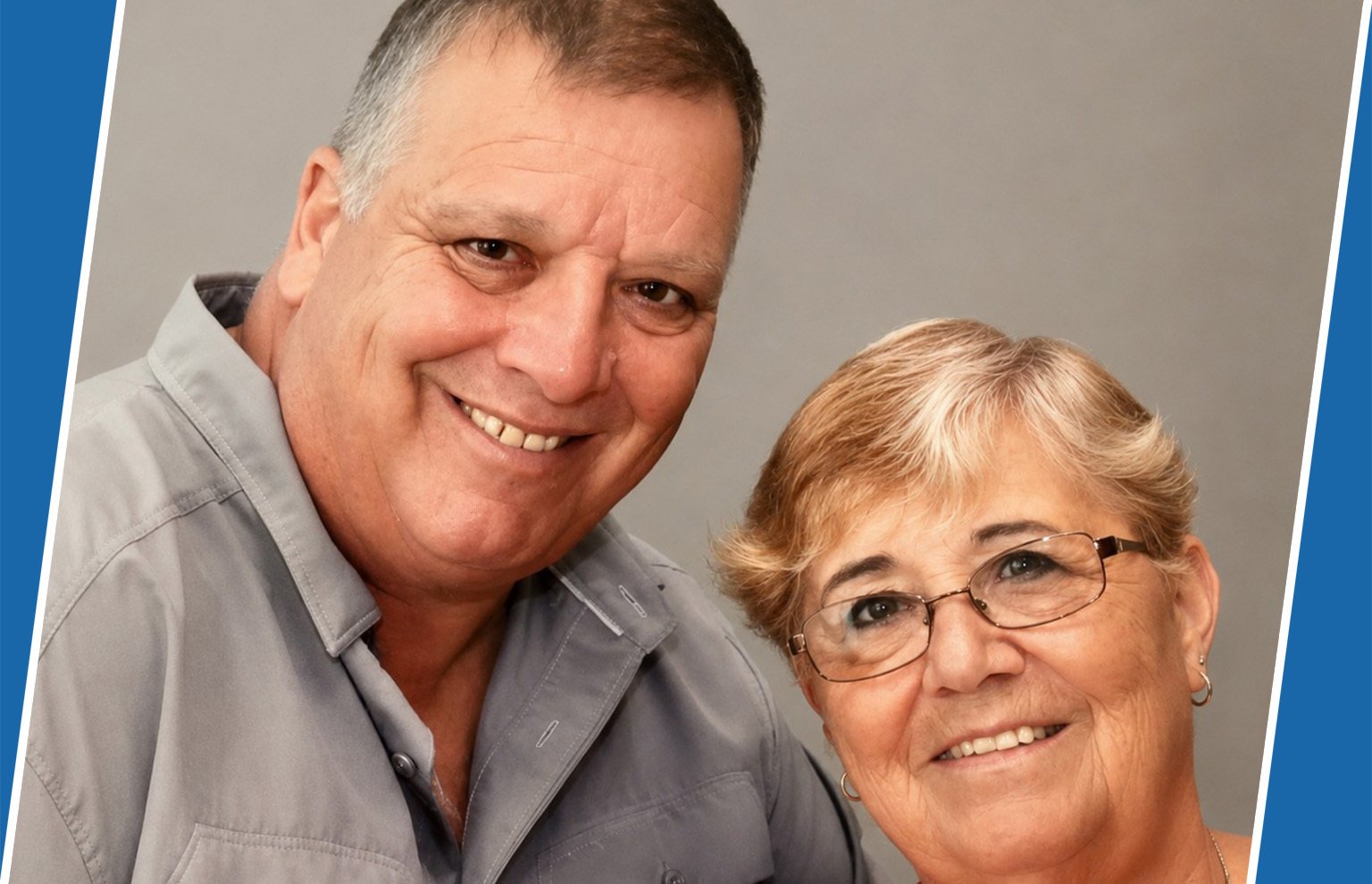 Smiling older man and woman with glasses posing together