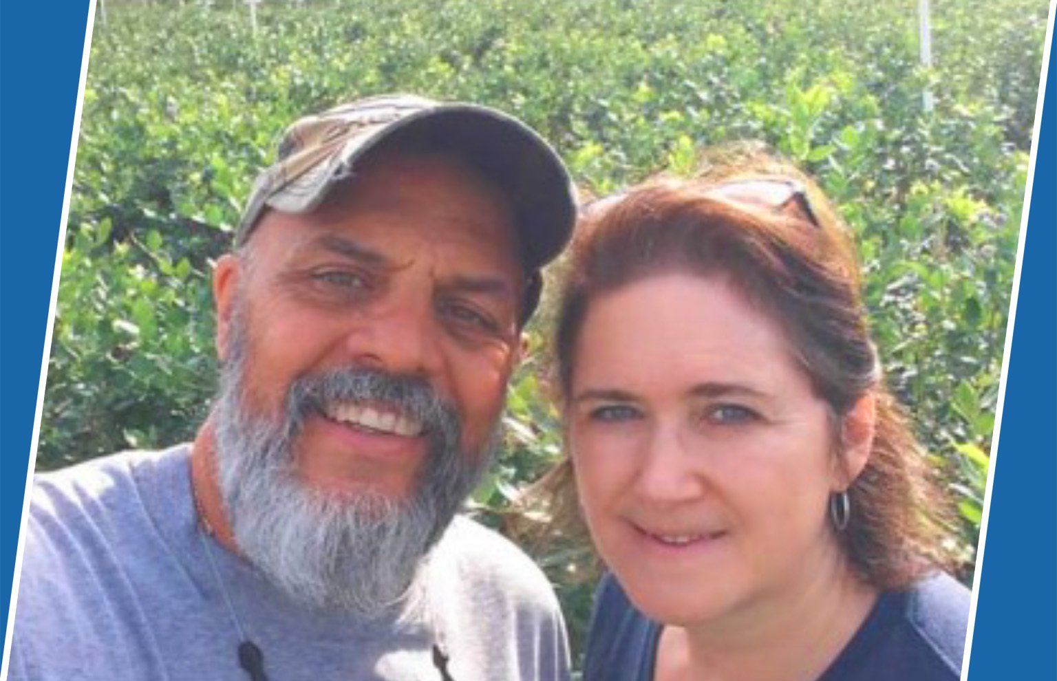Smiling bearded man in a ballcap beside a smiling woman outdoors